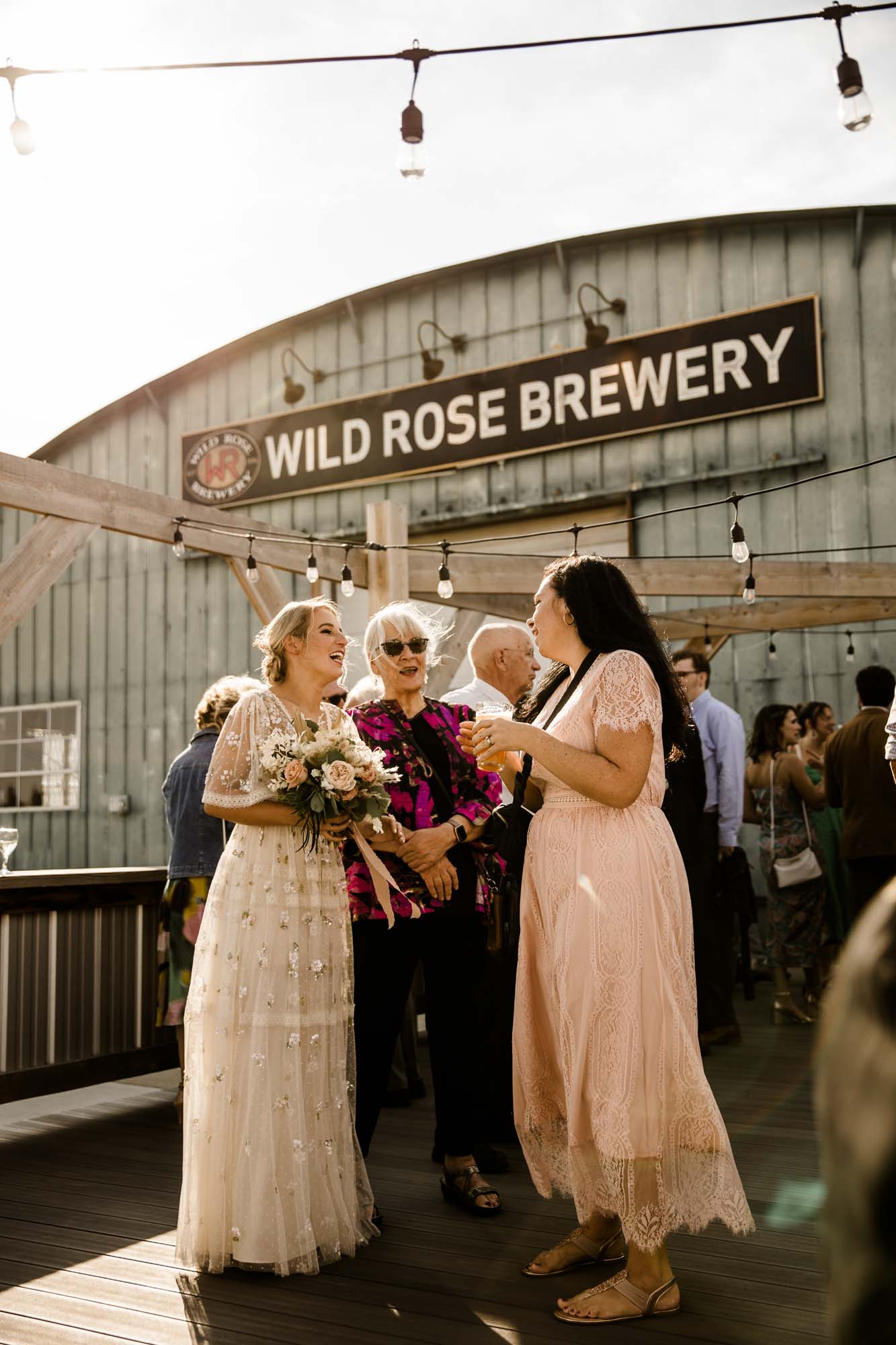 Wild Rose Brewery Calgary Wedding Photographer, couple on their wedding day at Bowmont Park, the Botanical Gardens of Silver Springs and Wild Rose Brewery