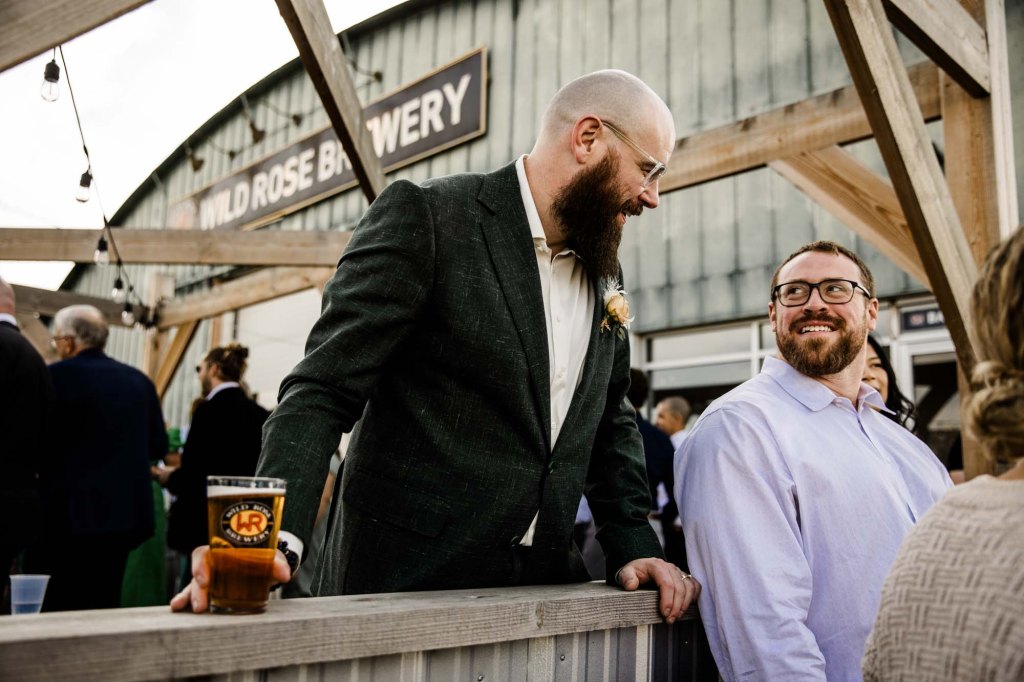 Wild Rose Brewery Calgary Wedding Photographer, couple on their wedding day at Bowmont Park, the Botanical Gardens of Silver Springs and Wild Rose Brewery