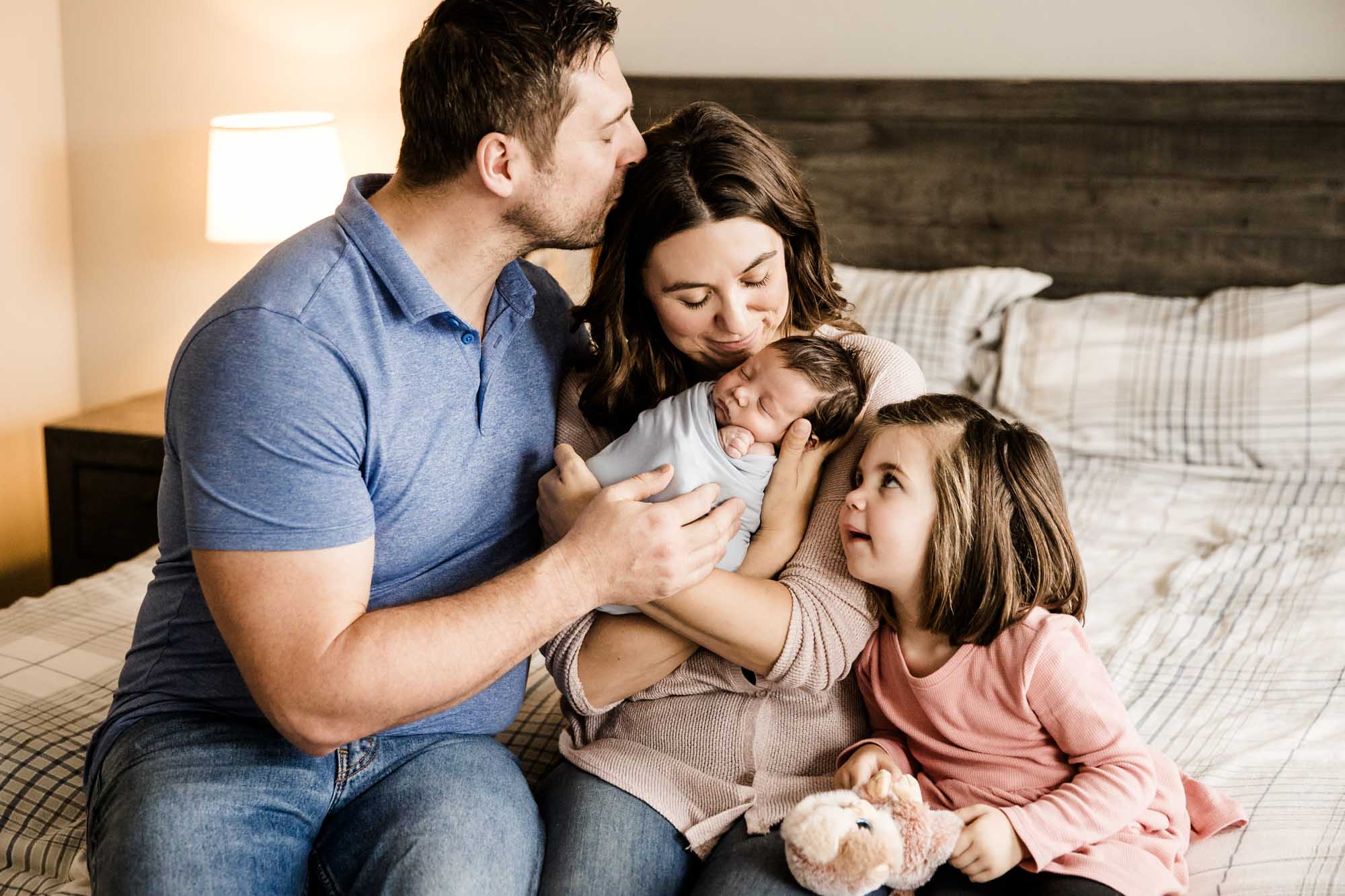 Calgary in-home lifesetyle newborn and maternity photographer, photos of a new baby during his newborn photoshoot