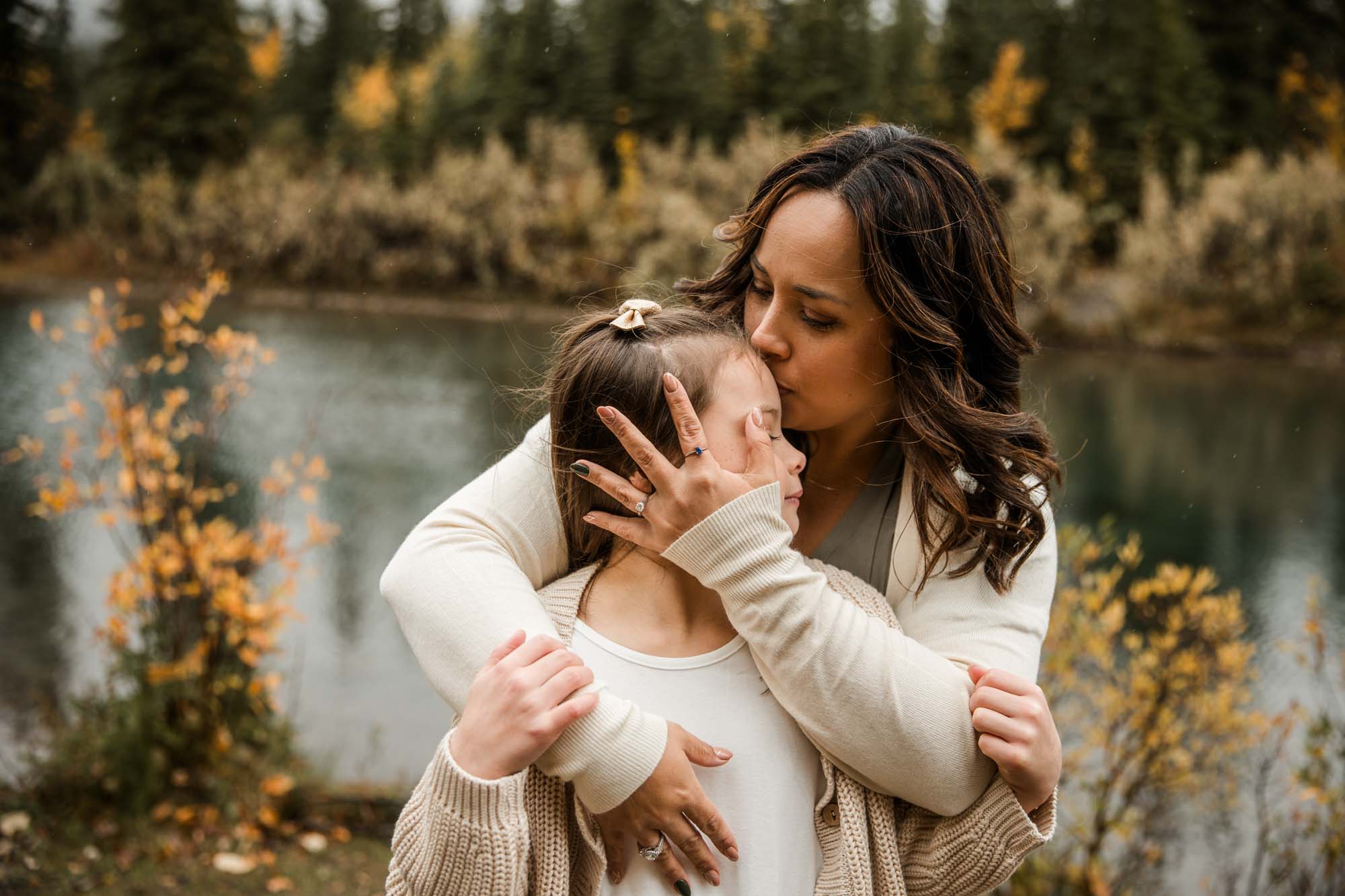 Calgary, Banff, Canmore, Kananaskis Country family photographer, family in front of the mountains in Kananaksis Country during their photoshoot
