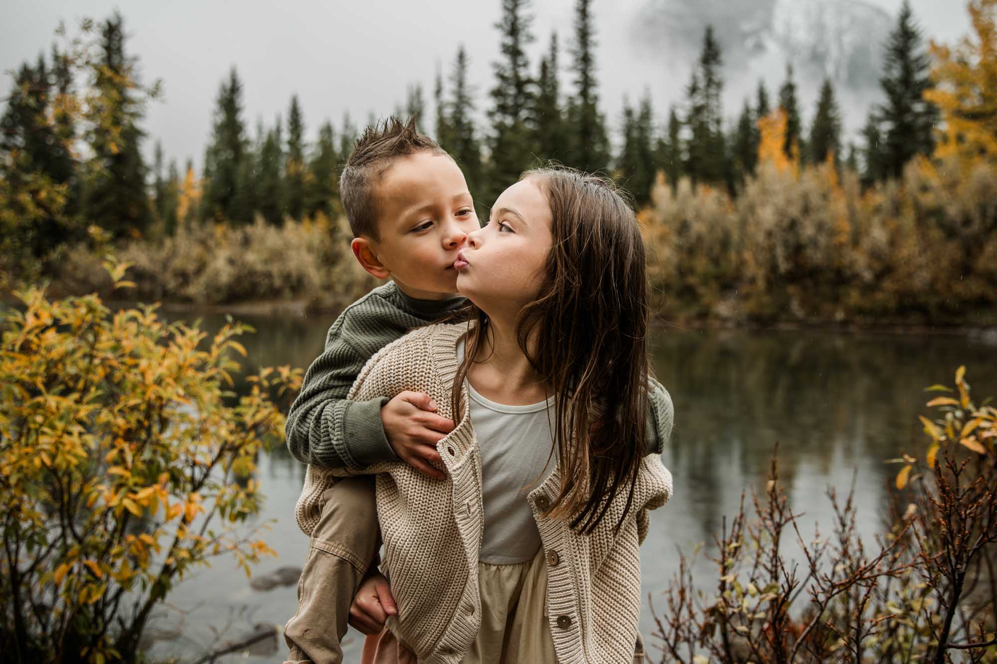 Calgary, Banff, Canmore, Kananaskis Country family photographer, family in front of the mountains in Kananaksis Country during their photoshoot