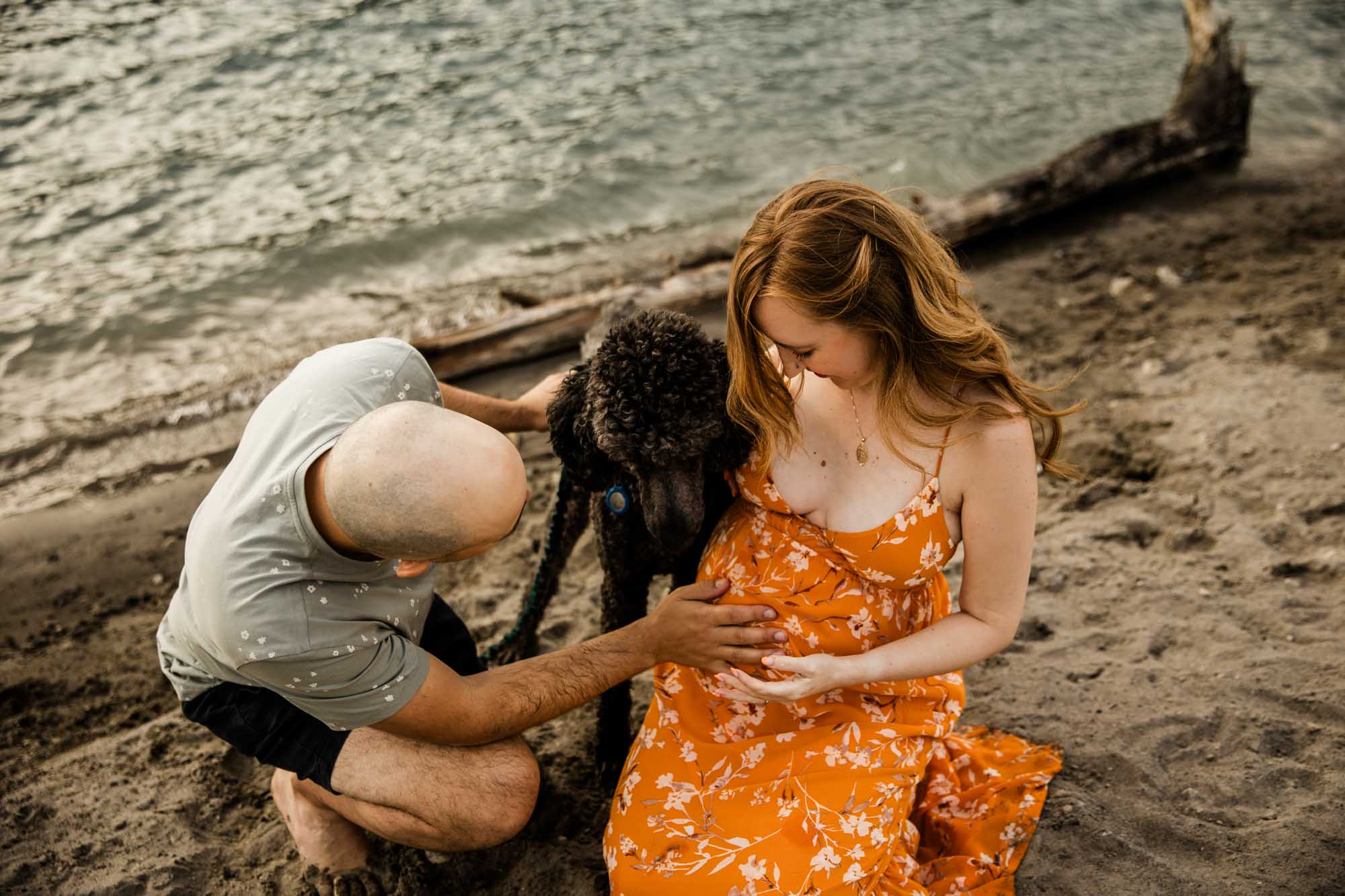 Calgary, Banff, Kananaskis Country maternity, family, newborn photographer, couple in front of the mountains during their maternity photoshoot in Kananaskis Country