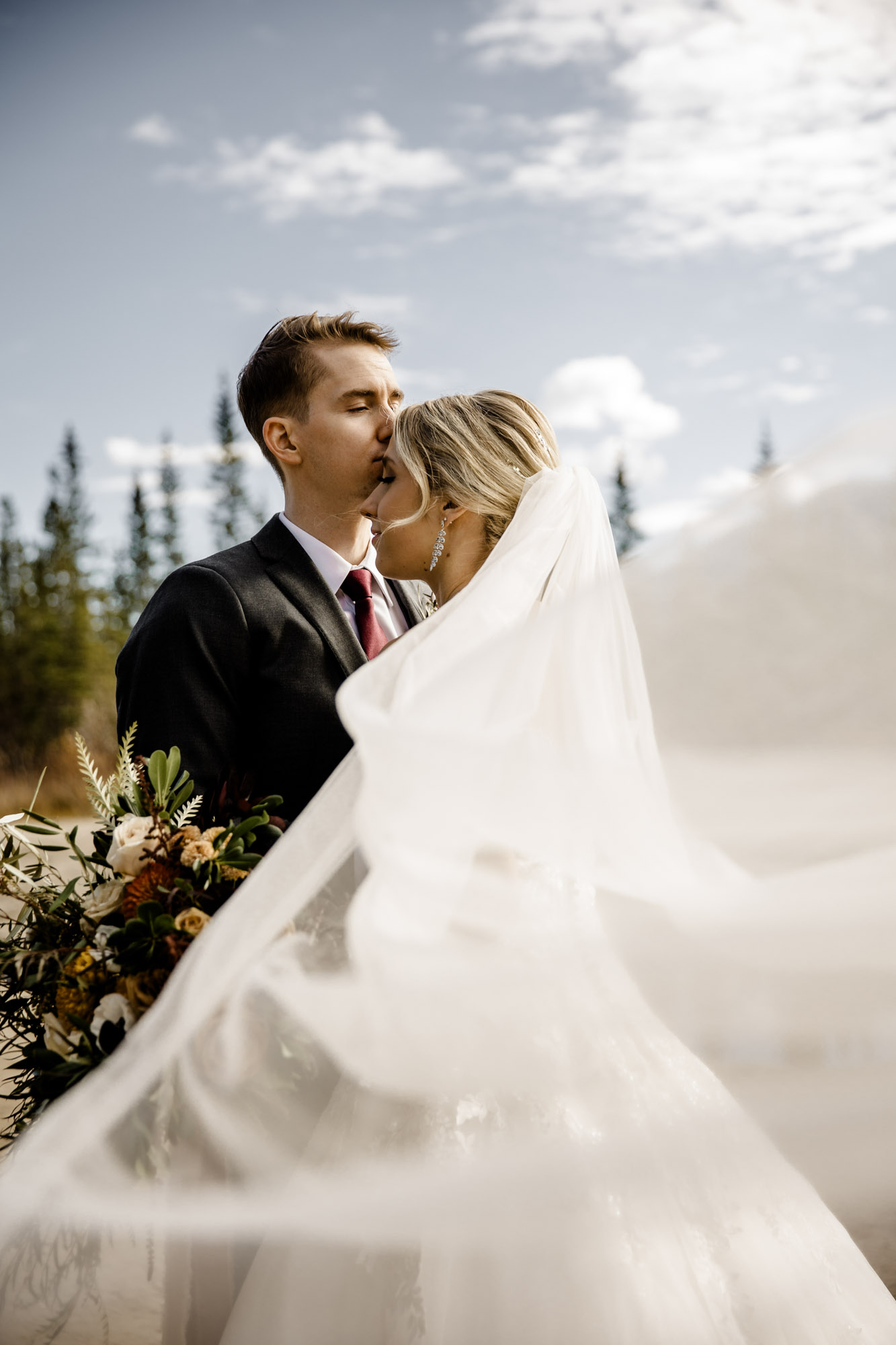 Calgary and Canmore wedding photographer, photography during a wedding at the Bear and Bison Inn in Canmore in the mountains