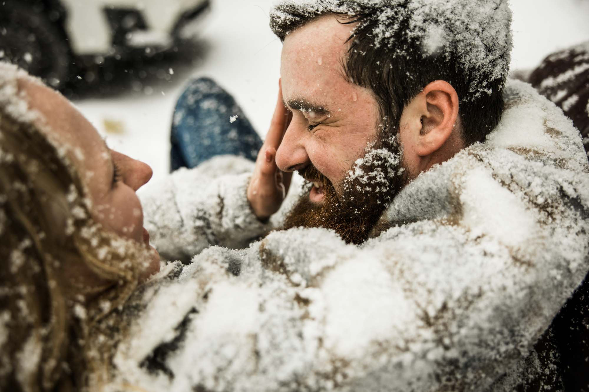 Calgary, Banff, Canmore, Kananaskis Country wedding photographer, photos of a couple during their engagement session photoshoot in the mountains in Banff at Lake Minnewanka during the winter