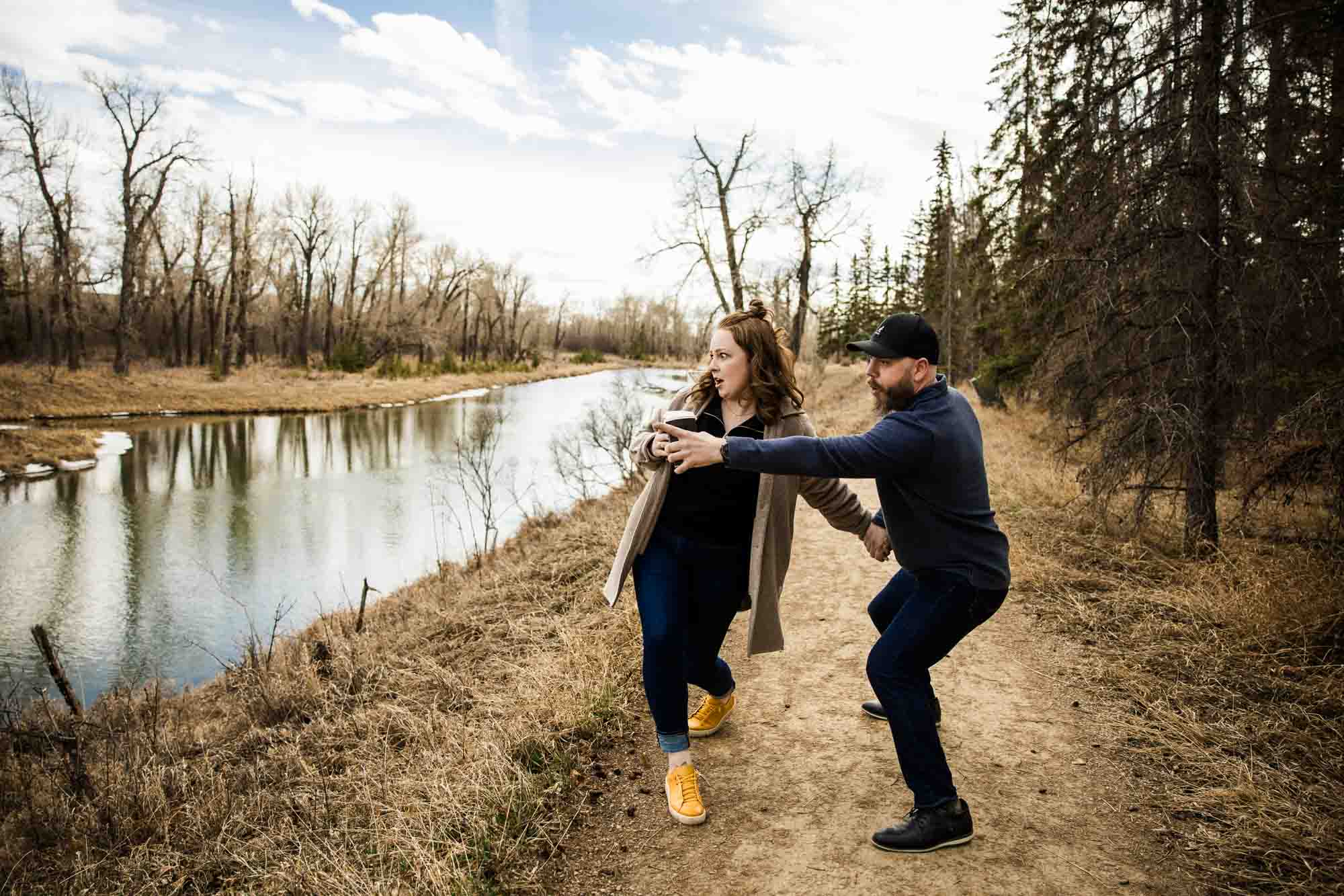 Calgary, Banff, Canmore, Kananaskis Country wedding photographer, photos of a couple during their engagement session photoshoot at Inglewood Bird Sanctuary in Calgary