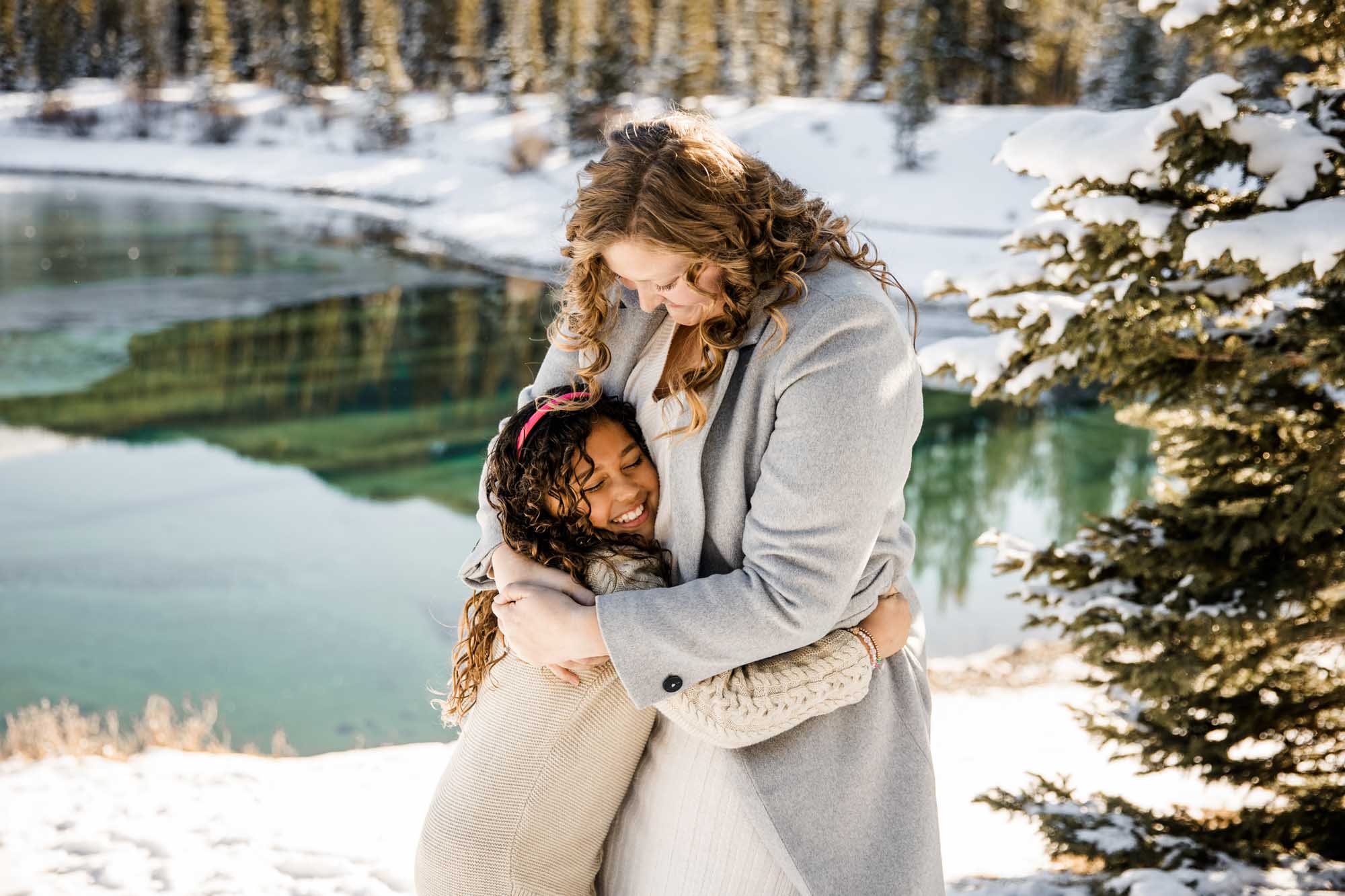 Calgary, Kananaskis Country, Banff lifestyle family photographer, family in the mountains in Kananaskis Country during a winter mini photo session
