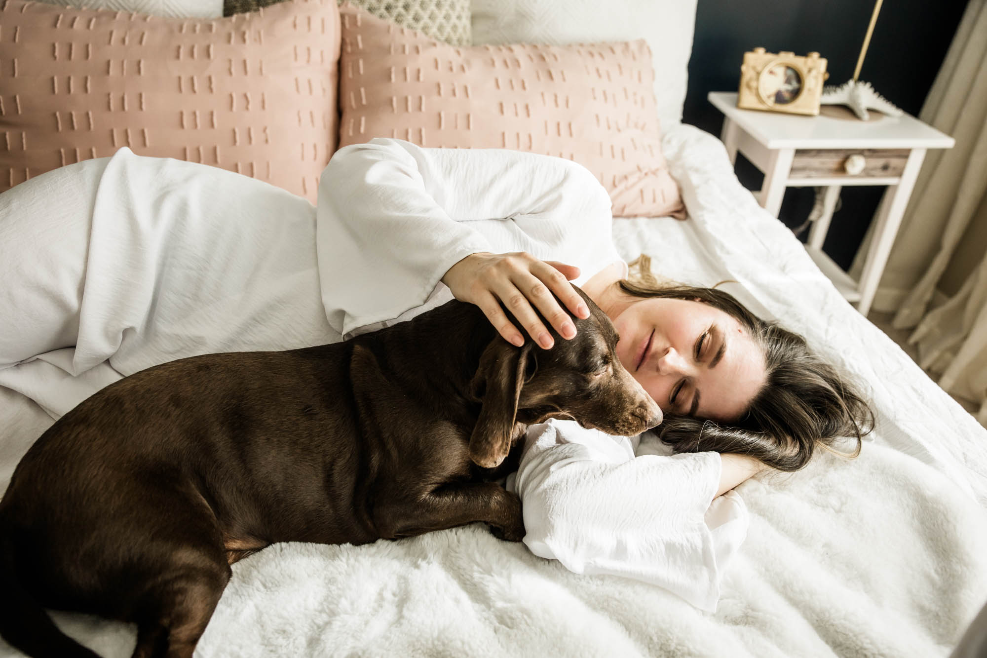 Calgary lifestyle newborn and maternity photographer, family in their home during a newborn photo session with their new baby, lifestyle photos and posed basket photos
