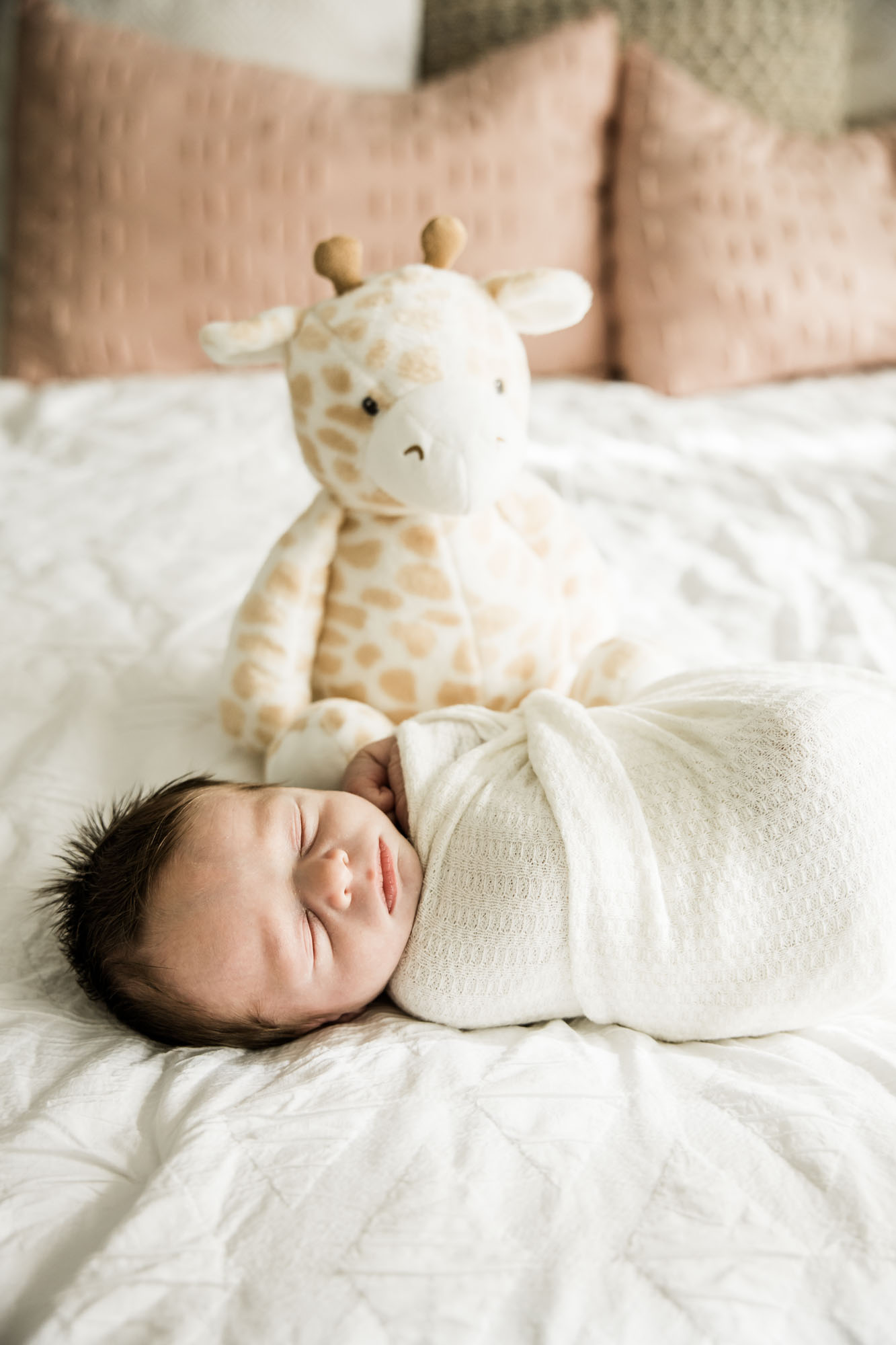 Calgary lifestyle newborn and maternity photographer, family in their home during a newborn photo session with their new baby, lifestyle photos and posed basket photos