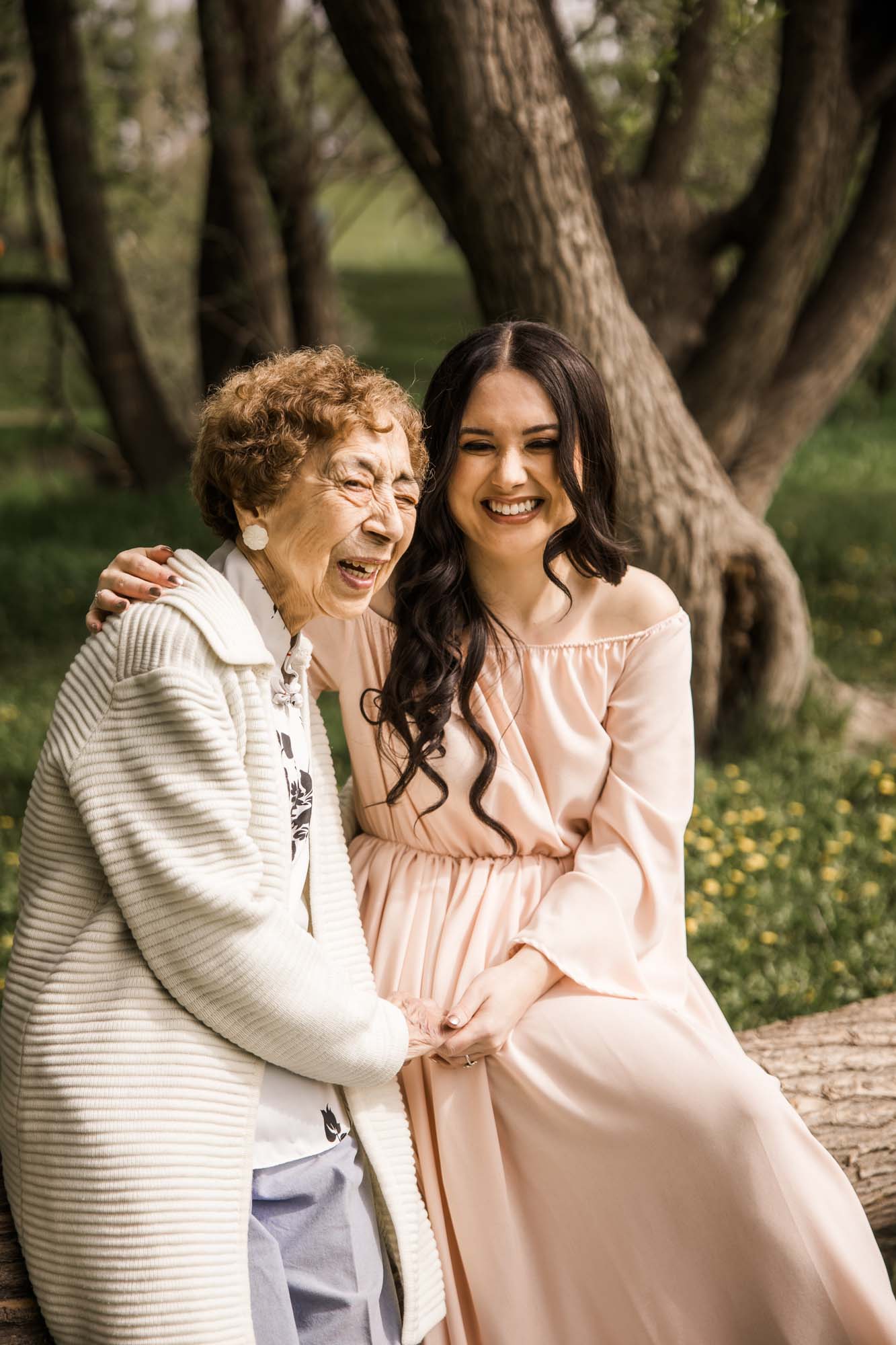 Calgary family photographer, family during their photoshoot with their grandparents, anniversary photos