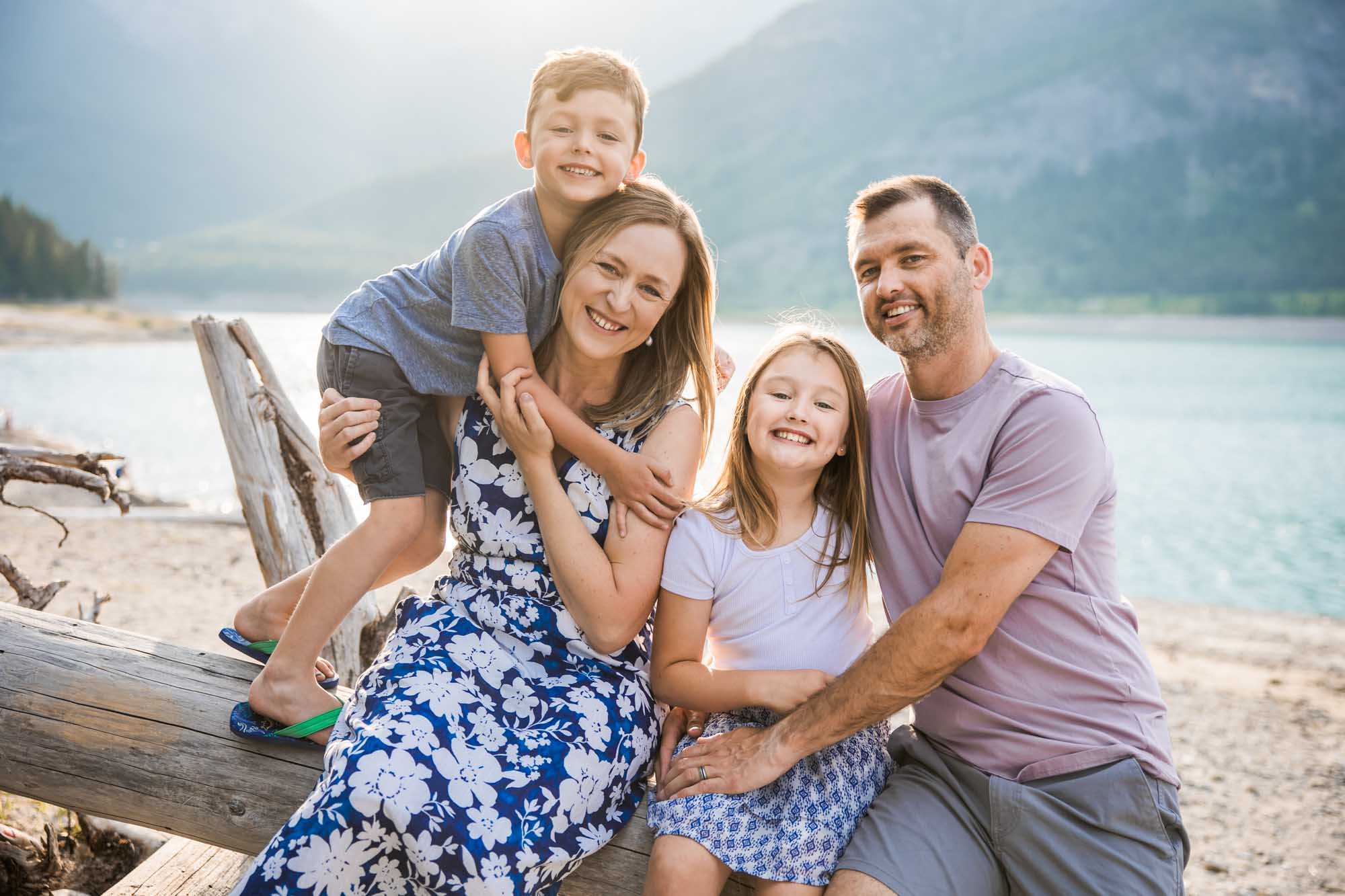 Calgary, Banff, Canmore, Kananaskis Country lifestyle family photographer, family in front of the mountains in the Canadian Rockies during their mini session photoshoot