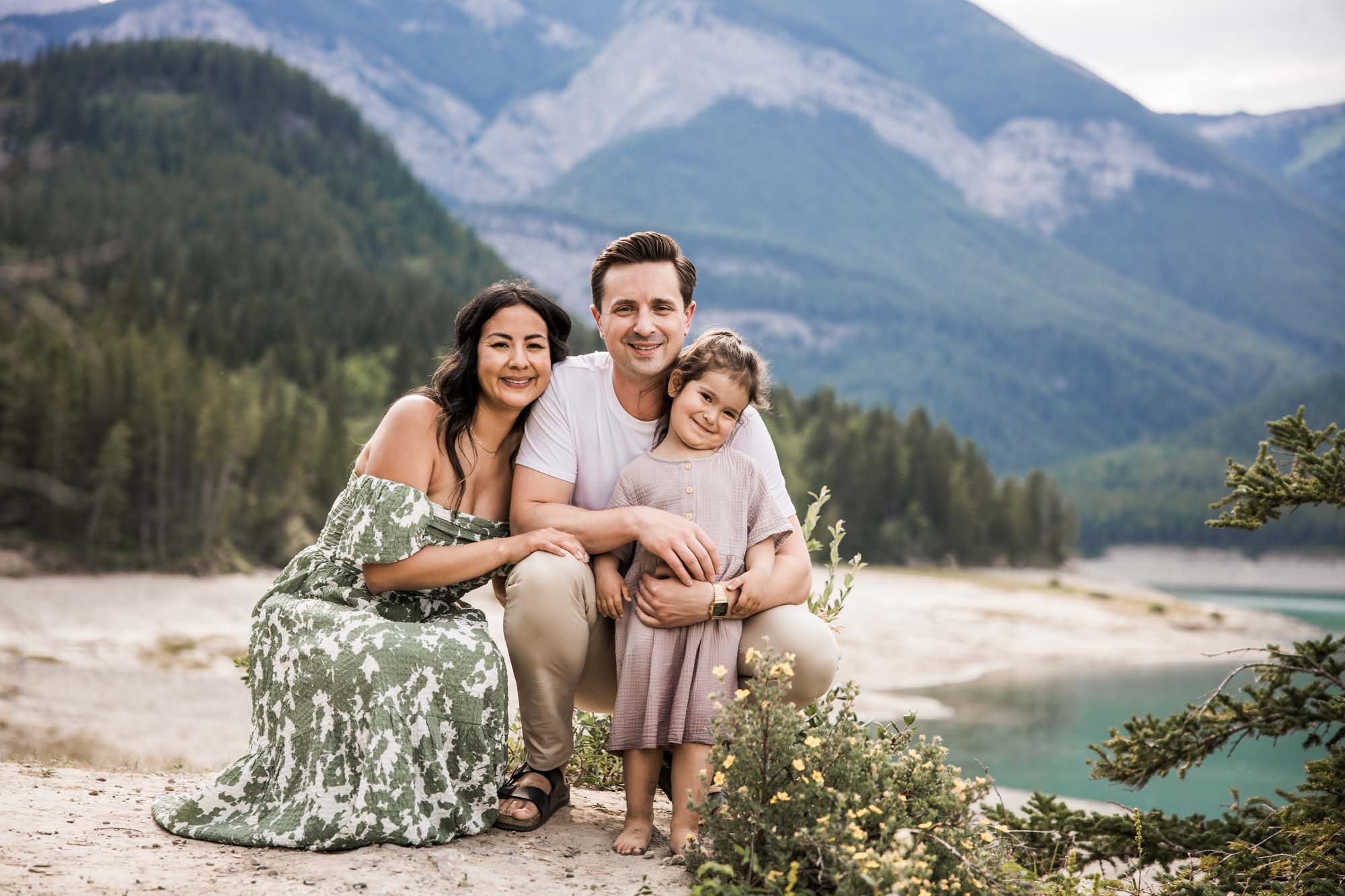 Calgary, Banff, Canmore, Kananaskis Country lifestyle family photographer, family in front of the mountains in the Canadian Rockies during their mini session photoshoot
