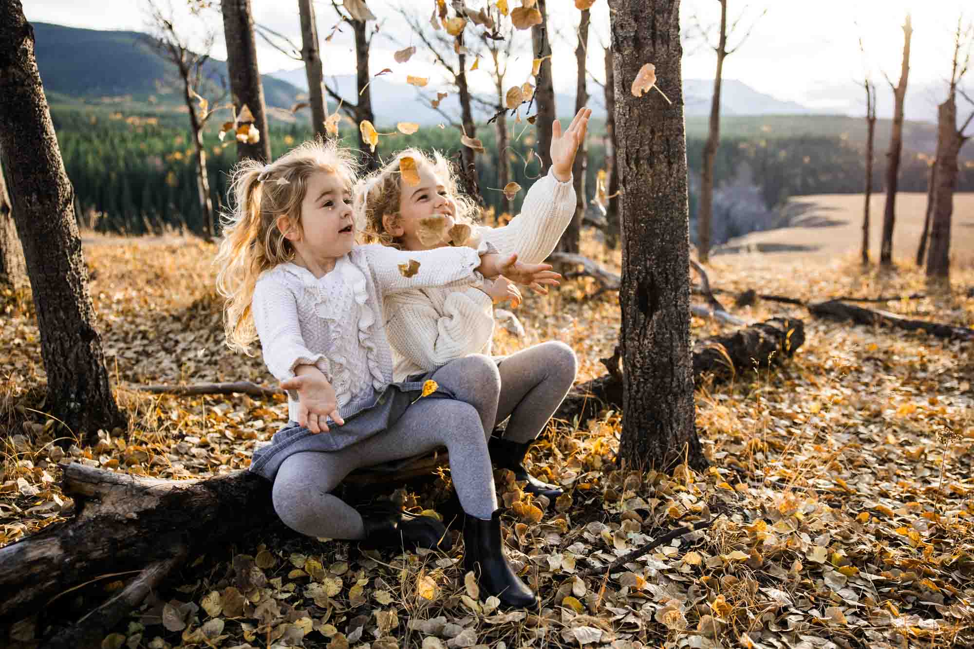 Calgary, Banff, Canmore, Kananaskis lifestyle family photographer, family in the mountains at sunset suring their photoshoot, with real candid documentary style