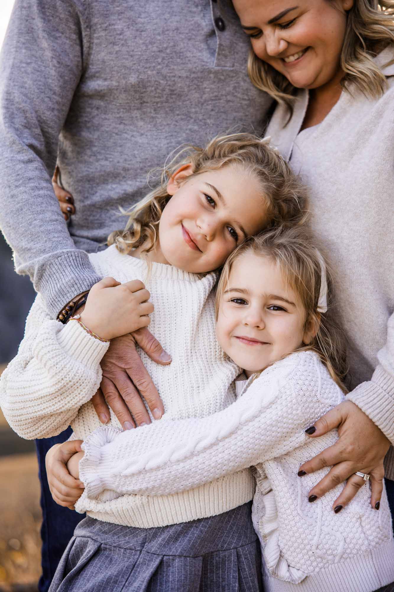 Calgary, Banff, Canmore, Kananaskis lifestyle family photographer, family in the mountains at sunset suring their photoshoot, with real candid documentary style