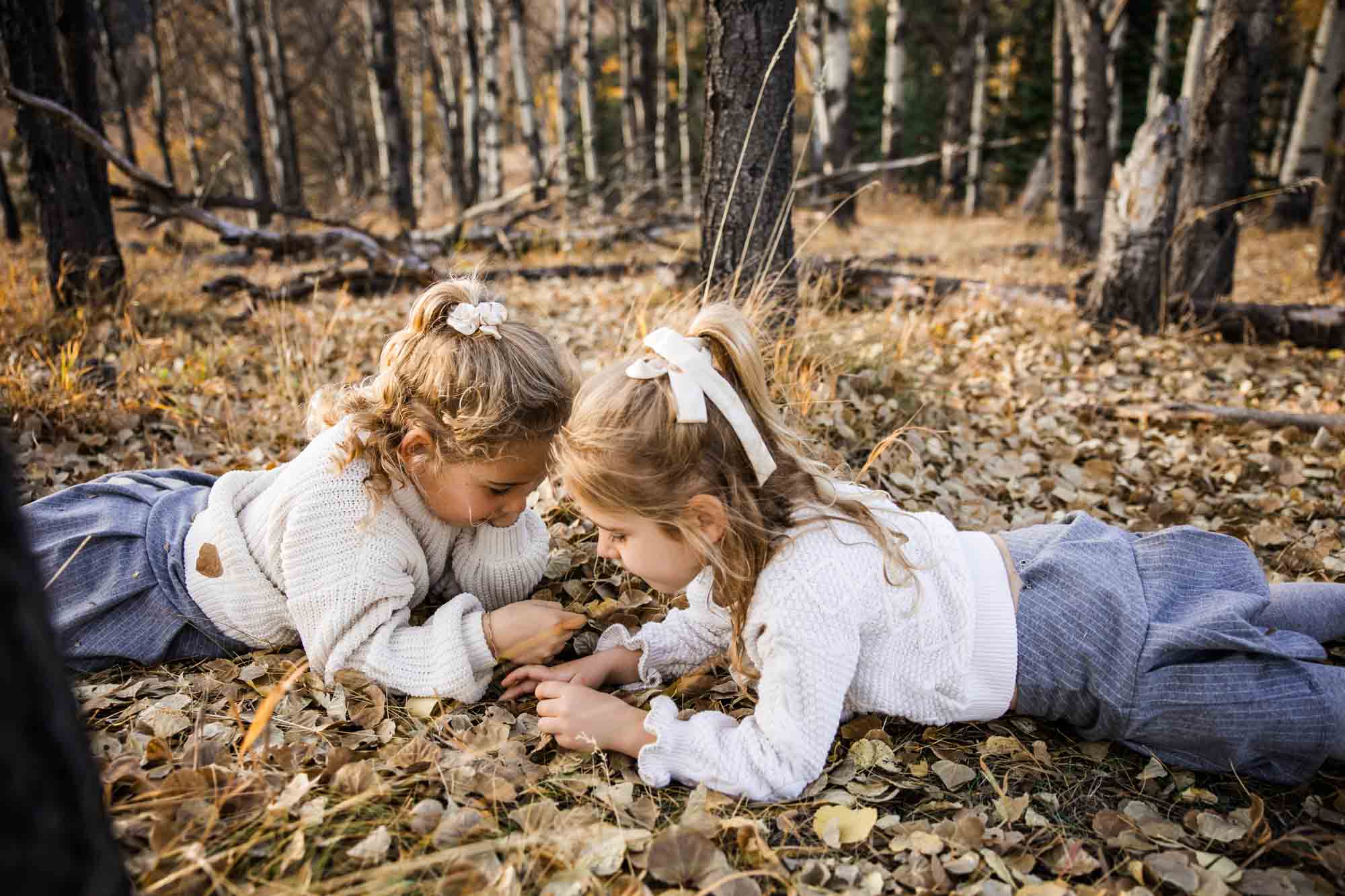 Calgary, Banff, Canmore, Kananaskis lifestyle family photographer, family in the mountains at sunset suring their photoshoot, with real candid documentary style