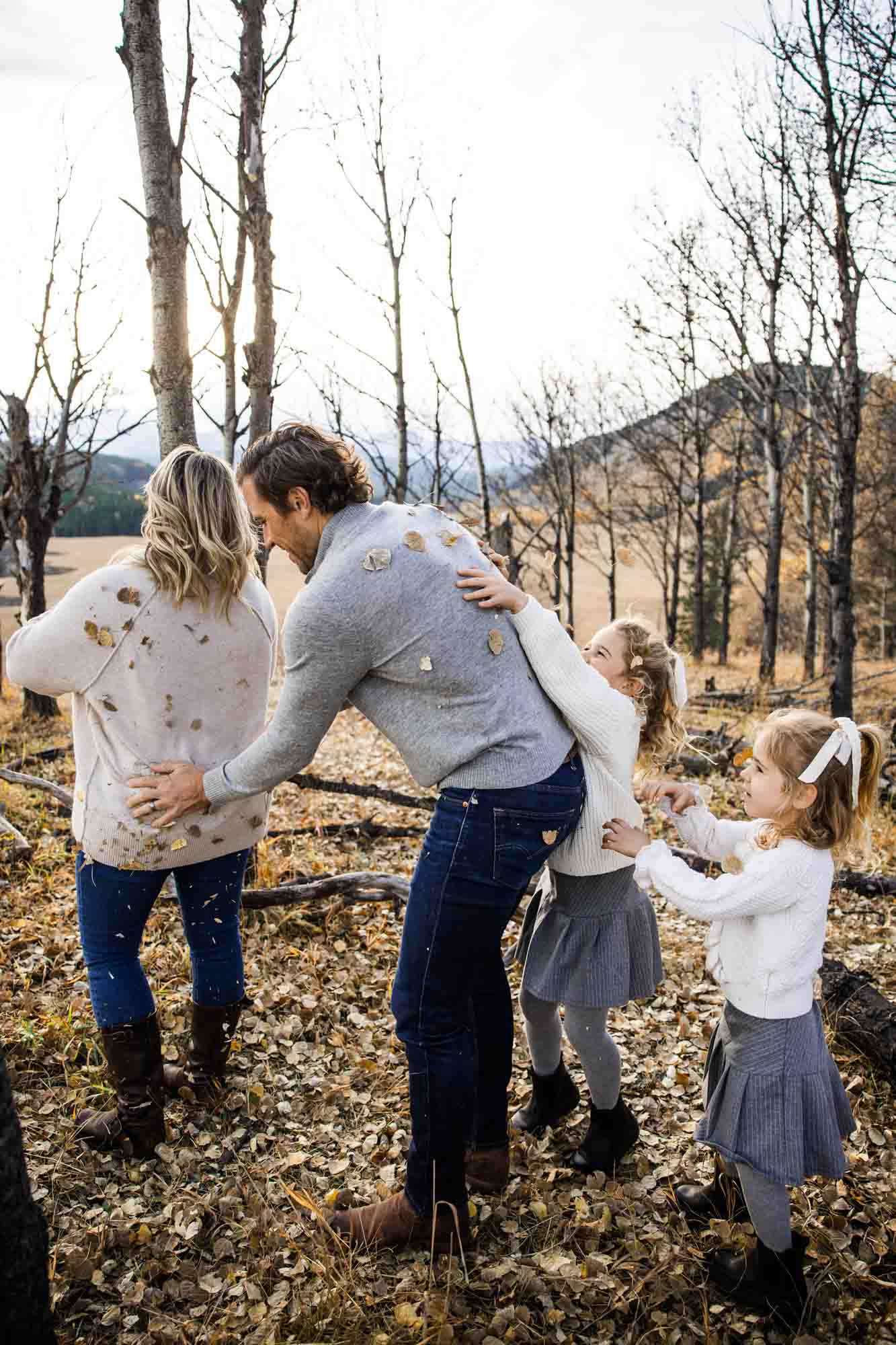 Calgary, Banff, Canmore, Kananaskis lifestyle family photographer, family in the mountains at sunset suring their photoshoot, with real candid documentary style