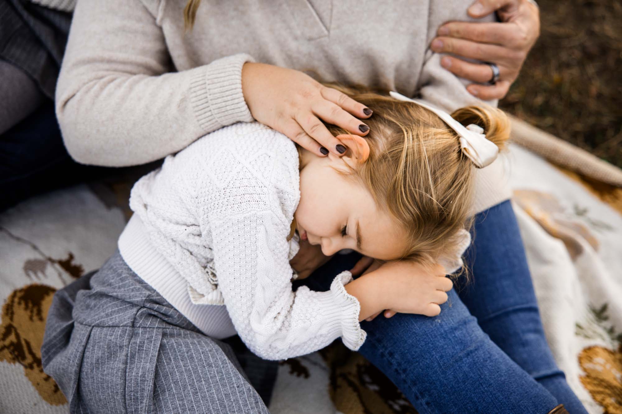 Calgary, Banff, Canmore, Kananaskis lifestyle family photographer, family in the mountains at sunset suring their photoshoot, with real candid documentary style