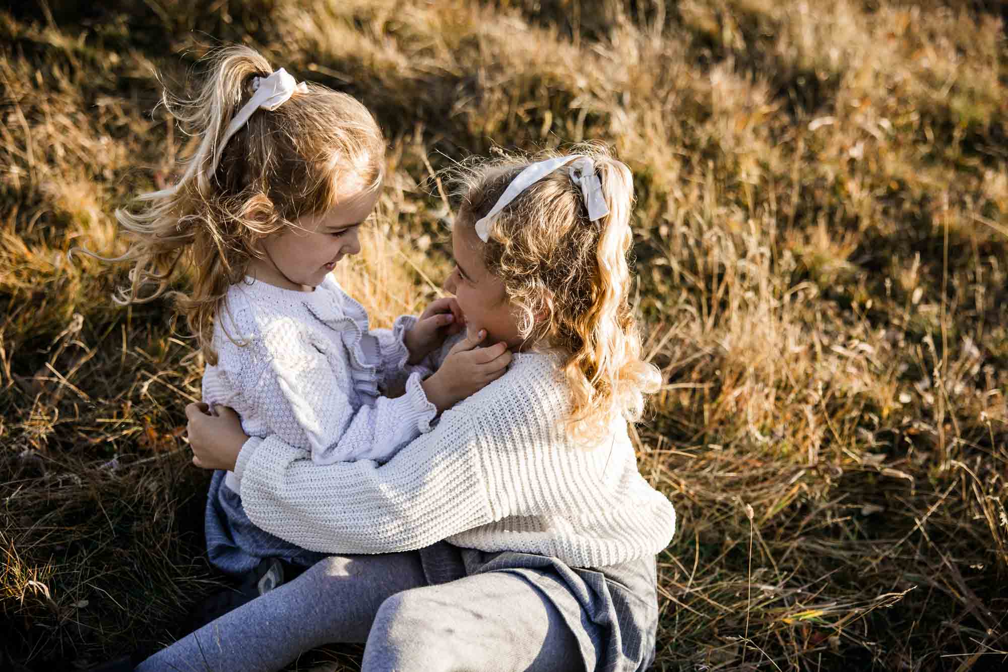 Calgary, Banff, Canmore, Kananaskis lifestyle family photographer, family in the mountains at sunset suring their photoshoot, with real candid documentary style