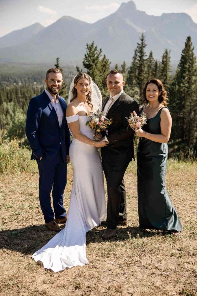 Calgary, Banff, Canmore, Kananaskis Country engagement and wedding photographer, couple on their wedding day at the Pomeroy Kananaskis Lodge, photoshoot in the mountains, storytelling, candid, warm, editorial photography