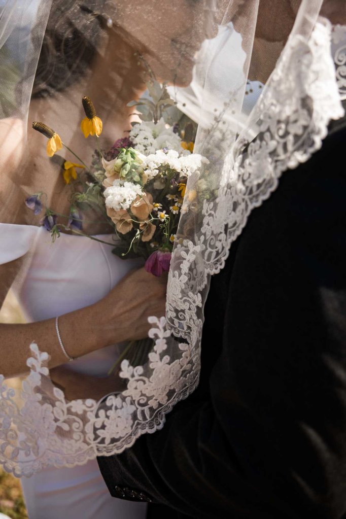 Calgary, Banff, Canmore, Kananaskis Country engagement and wedding photographer, couple on their wedding day at the Pomeroy Kananaskis Lodge, photoshoot in the mountains, storytelling, candid, warm, editorial photography