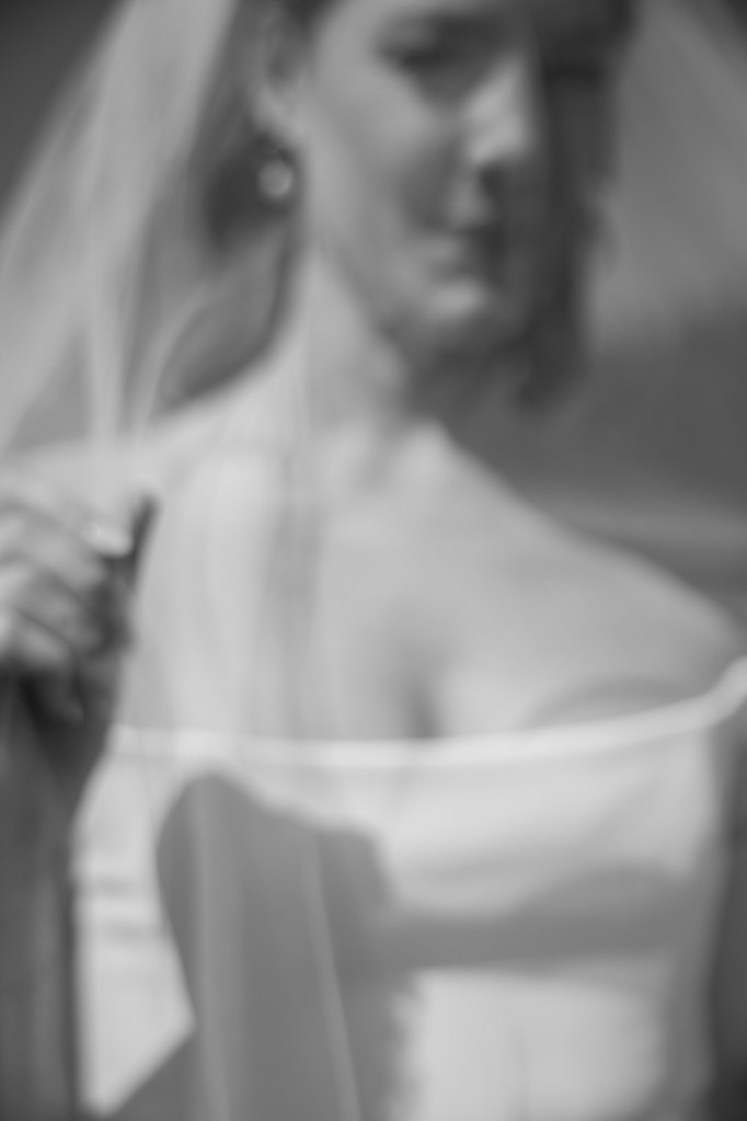 Calgary, Banff, Canmore, Kananaskis Country engagement and wedding photographer, couple on their wedding day at the Pomeroy Kananaskis Lodge, photoshoot in the mountains, storytelling, candid, warm, editorial photography