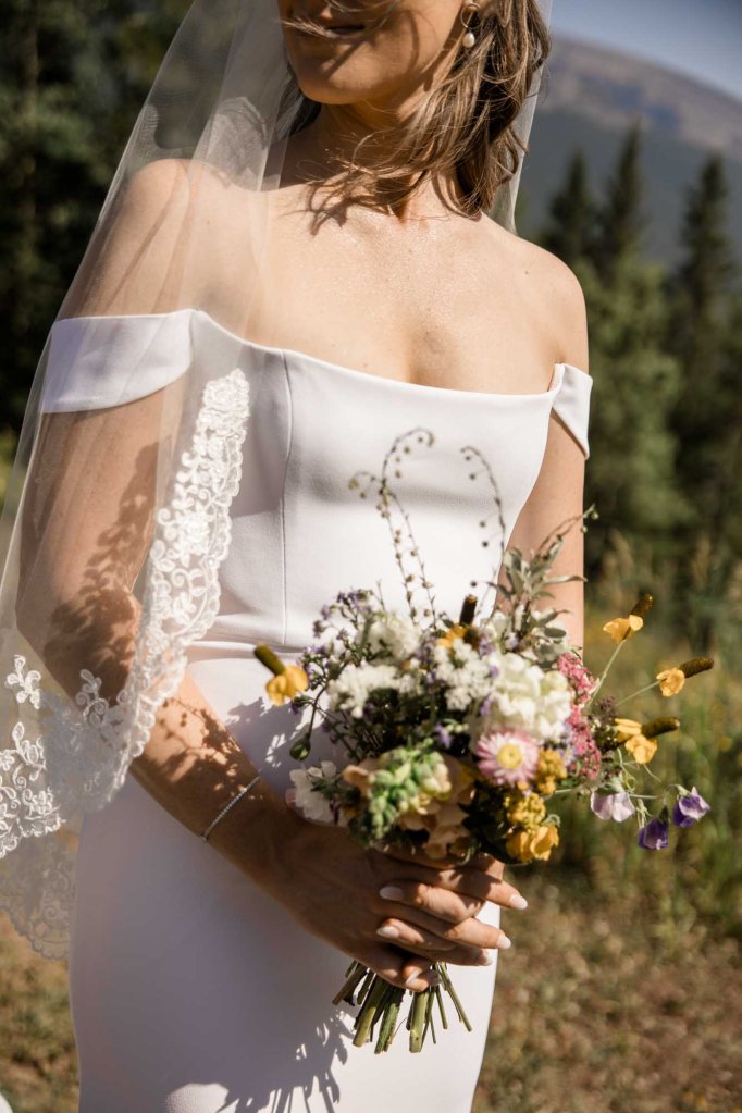 Calgary, Banff, Canmore, Kananaskis Country engagement and wedding photographer, couple on their wedding day at the Pomeroy Kananaskis Lodge, photoshoot in the mountains, storytelling, candid, warm, editorial photography