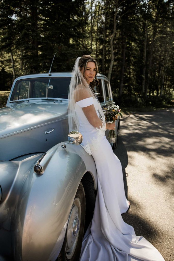 Calgary, Banff, Canmore, Kananaskis Country engagement and wedding photographer, couple on their wedding day at the Pomeroy Kananaskis Lodge, photoshoot in the mountains, storytelling, candid, warm, editorial photography
