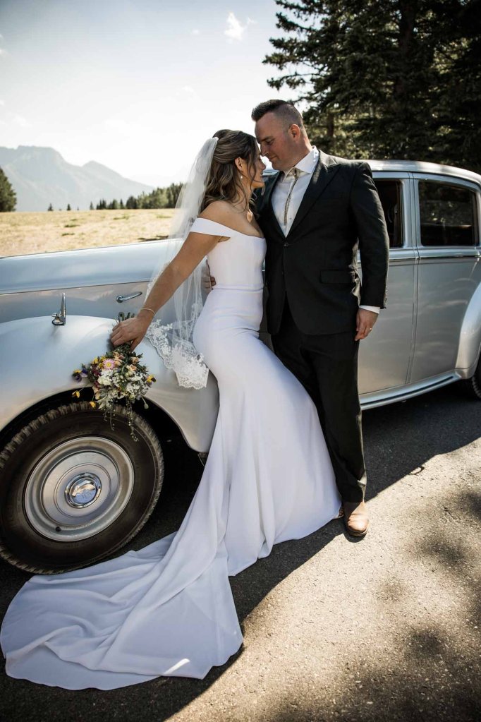 Calgary, Banff, Canmore, Kananaskis Country engagement and wedding photographer, couple on their wedding day at the Pomeroy Kananaskis Lodge, photoshoot in the mountains, storytelling, candid, warm, editorial photography