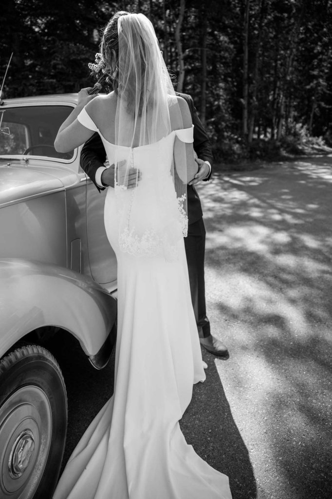 Calgary, Banff, Canmore, Kananaskis Country engagement and wedding photographer, couple on their wedding day at the Pomeroy Kananaskis Lodge, photoshoot in the mountains, storytelling, candid, warm, editorial photography