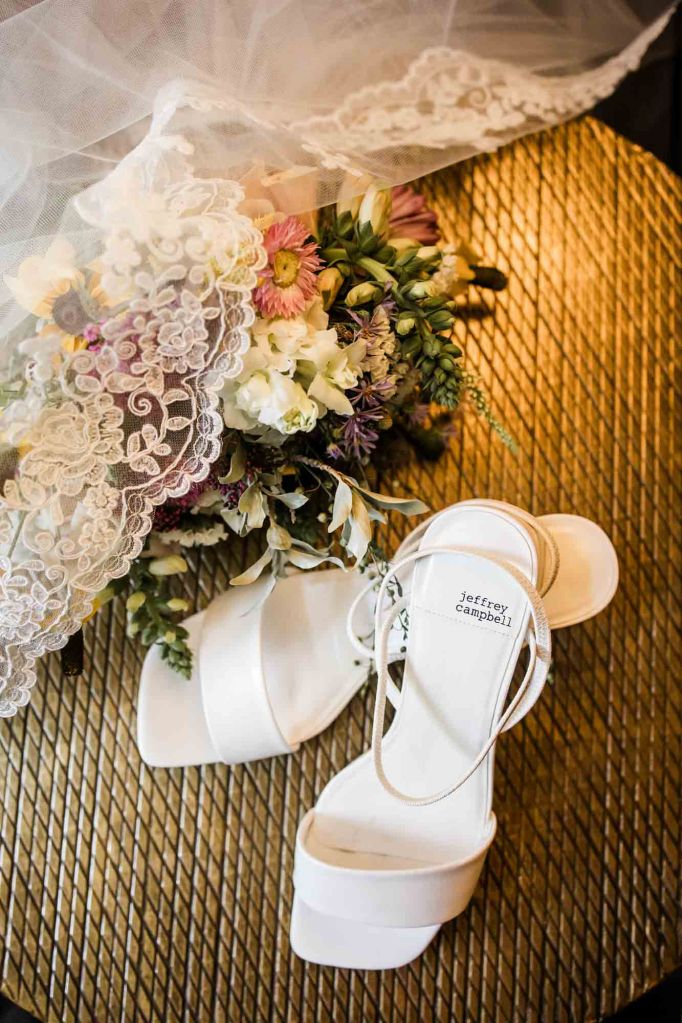 Calgary, Banff, Canmore, Kananaskis Country engagement and wedding photographer, couple on their wedding day at the Pomeroy Kananaskis Lodge, photoshoot in the mountains, storytelling, candid, warm, editorial photography