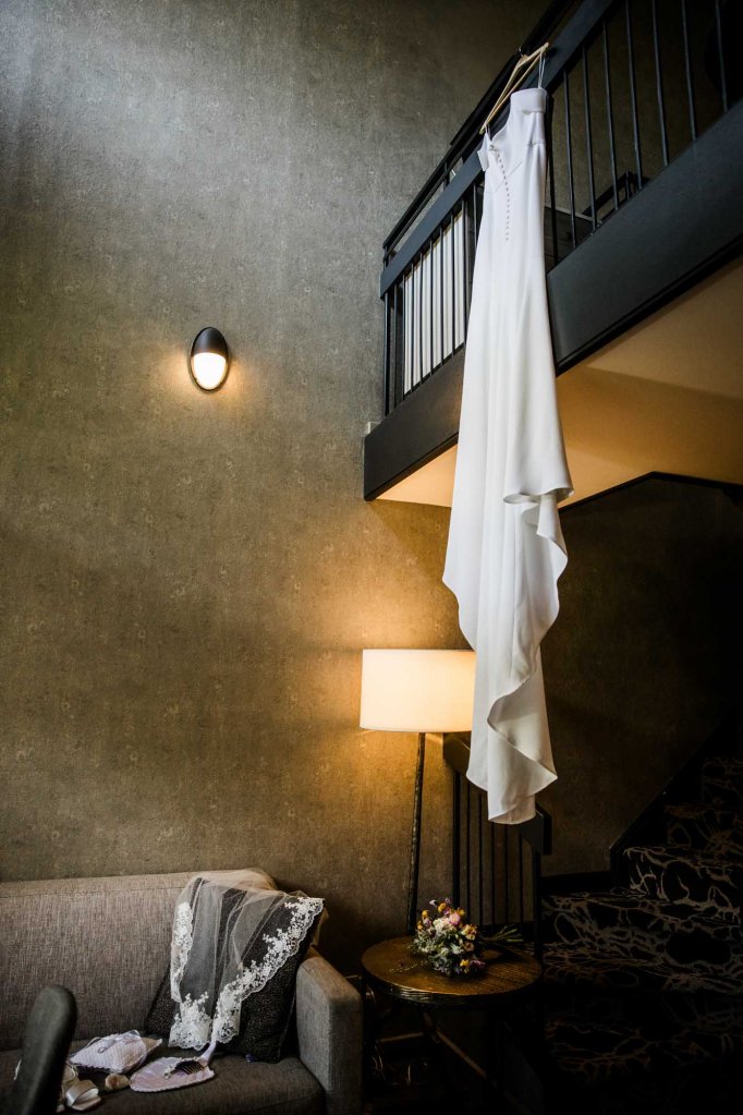 Calgary, Banff, Canmore, Kananaskis Country engagement and wedding photographer, couple on their wedding day at the Pomeroy Kananaskis Lodge, photoshoot in the mountains, storytelling, candid, warm, editorial photography