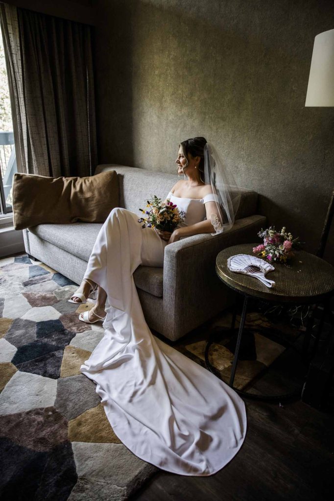 Calgary, Banff, Canmore, Kananaskis Country engagement and wedding photographer, couple on their wedding day at the Pomeroy Kananaskis Lodge, photoshoot in the mountains, storytelling, candid, warm, editorial photography