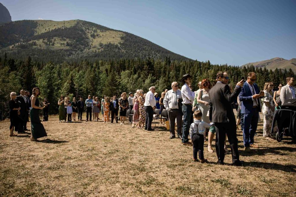 Calgary, Banff, Canmore, Kananaskis Country engagement and wedding photographer, couple on their wedding day at the Pomeroy Kananaskis Lodge, photoshoot in the mountains, storytelling, candid, warm, editorial photography