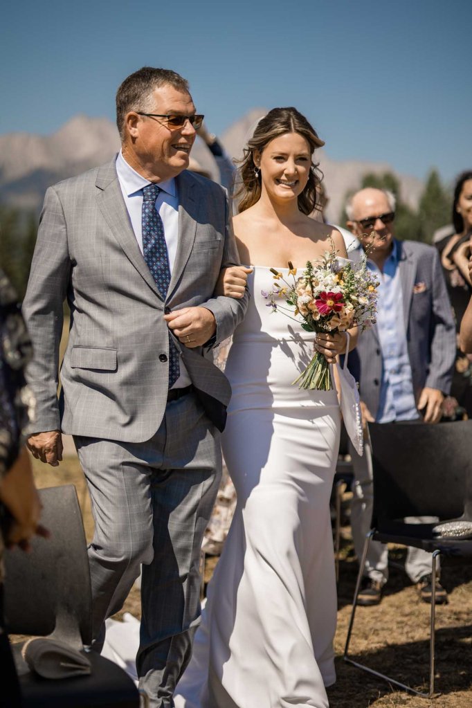 Calgary, Banff, Canmore, Kananaskis Country engagement and wedding photographer, couple on their wedding day at the Pomeroy Kananaskis Lodge, photoshoot in the mountains, storytelling, candid, warm, editorial photography