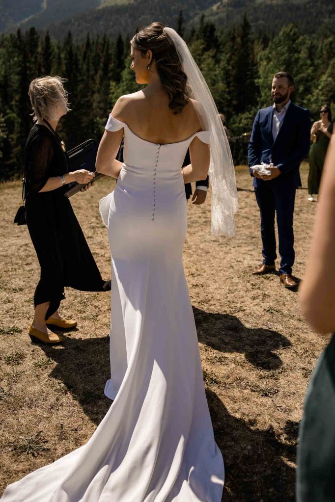 Calgary, Banff, Canmore, Kananaskis Country engagement and wedding photographer, couple on their wedding day at the Pomeroy Kananaskis Lodge, photoshoot in the mountains, storytelling, candid, warm, editorial photography