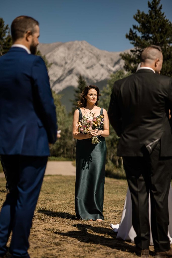 Calgary, Banff, Canmore, Kananaskis Country engagement and wedding photographer, couple on their wedding day at the Pomeroy Kananaskis Lodge, photoshoot in the mountains, storytelling, candid, warm, editorial photography