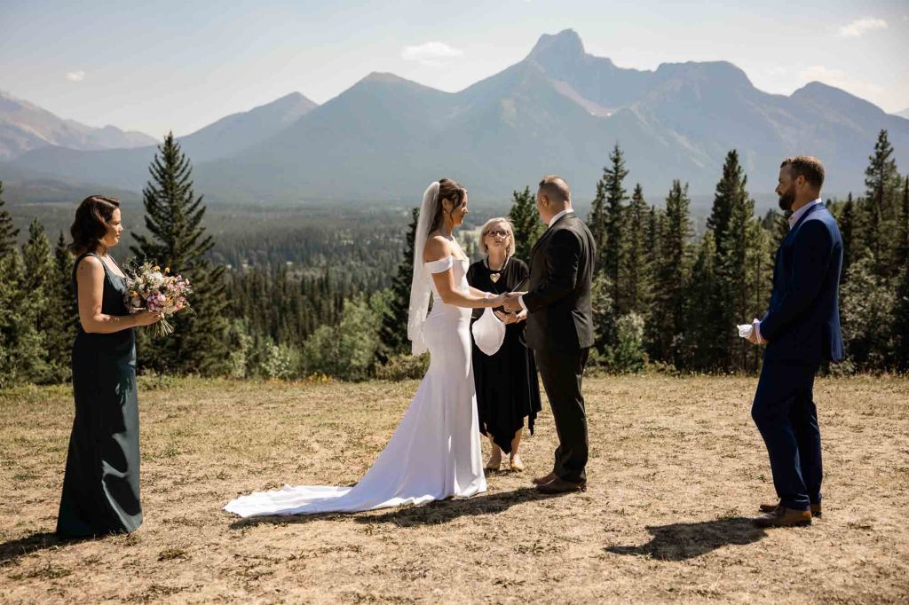 Calgary, Banff, Canmore, Kananaskis Country engagement and wedding photographer, couple on their wedding day at the Pomeroy Kananaskis Lodge, photoshoot in the mountains, storytelling, candid, warm, editorial photography