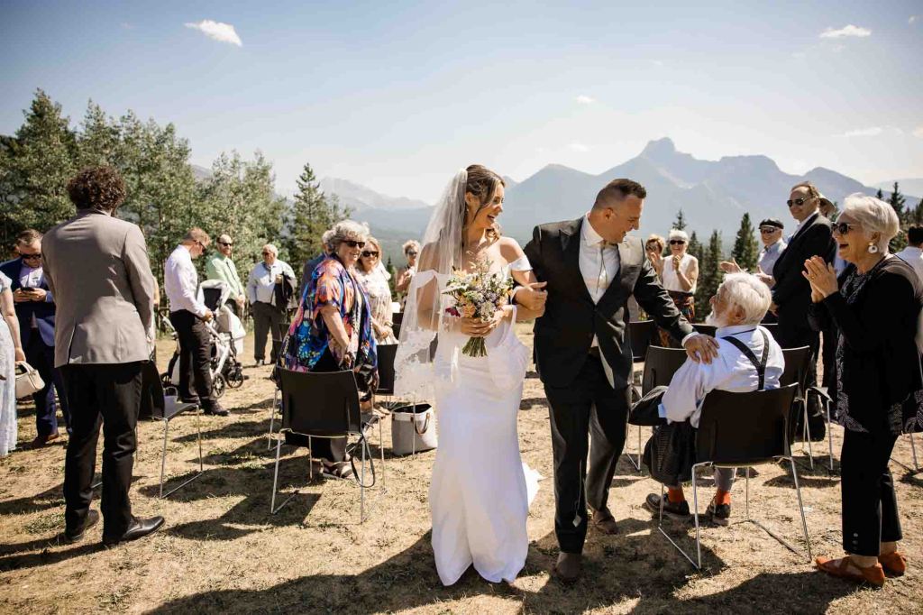 Calgary, Banff, Canmore, Kananaskis Country engagement and wedding photographer, couple on their wedding day at the Pomeroy Kananaskis Lodge, photoshoot in the mountains, storytelling, candid, warm, editorial photography