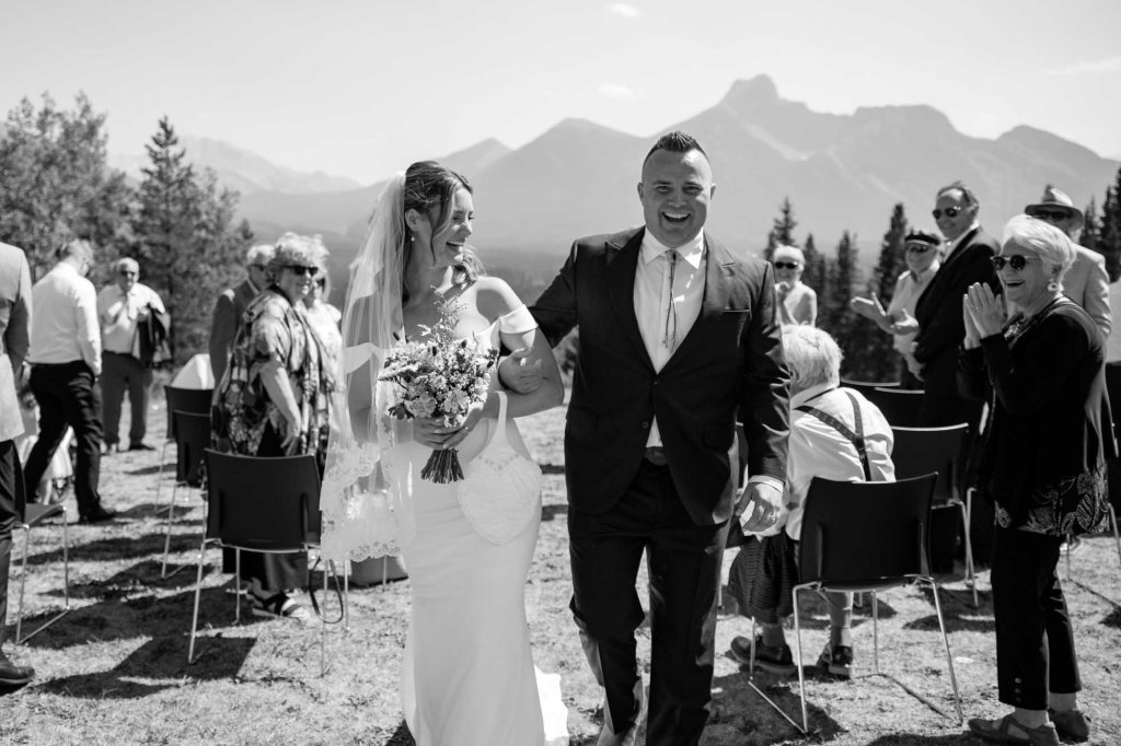 Calgary, Banff, Canmore, Kananaskis Country engagement and wedding photographer, couple on their wedding day at the Pomeroy Kananaskis Lodge, photoshoot in the mountains, storytelling, candid, warm, editorial photography
