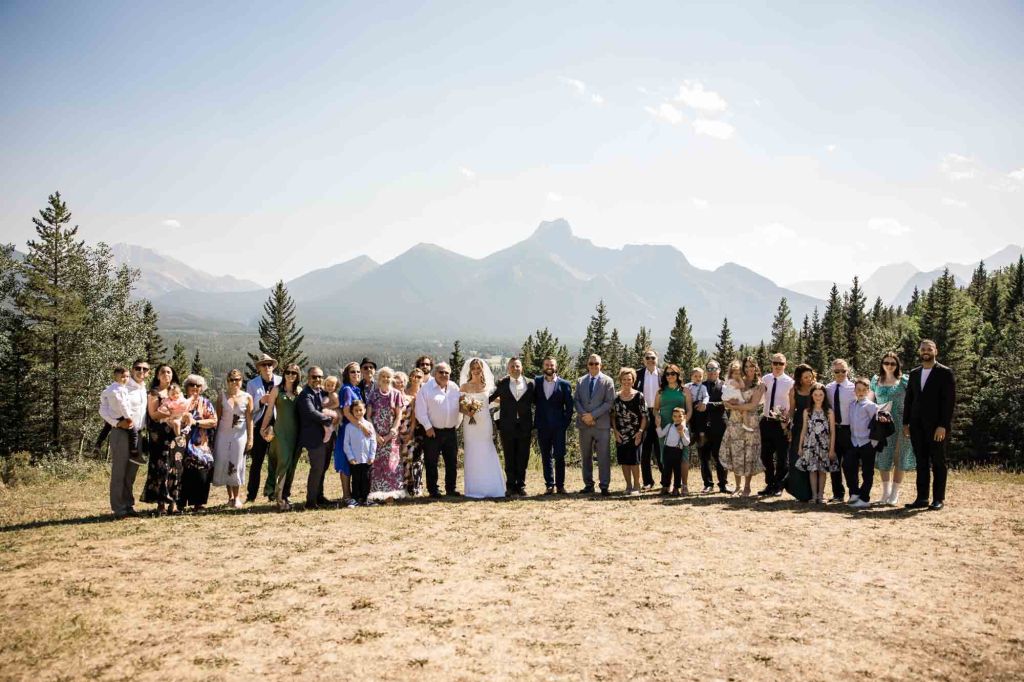 Calgary, Banff, Canmore, Kananaskis Country engagement and wedding photographer, couple on their wedding day at the Pomeroy Kananaskis Lodge, photoshoot in the mountains, storytelling, candid, warm, editorial photography