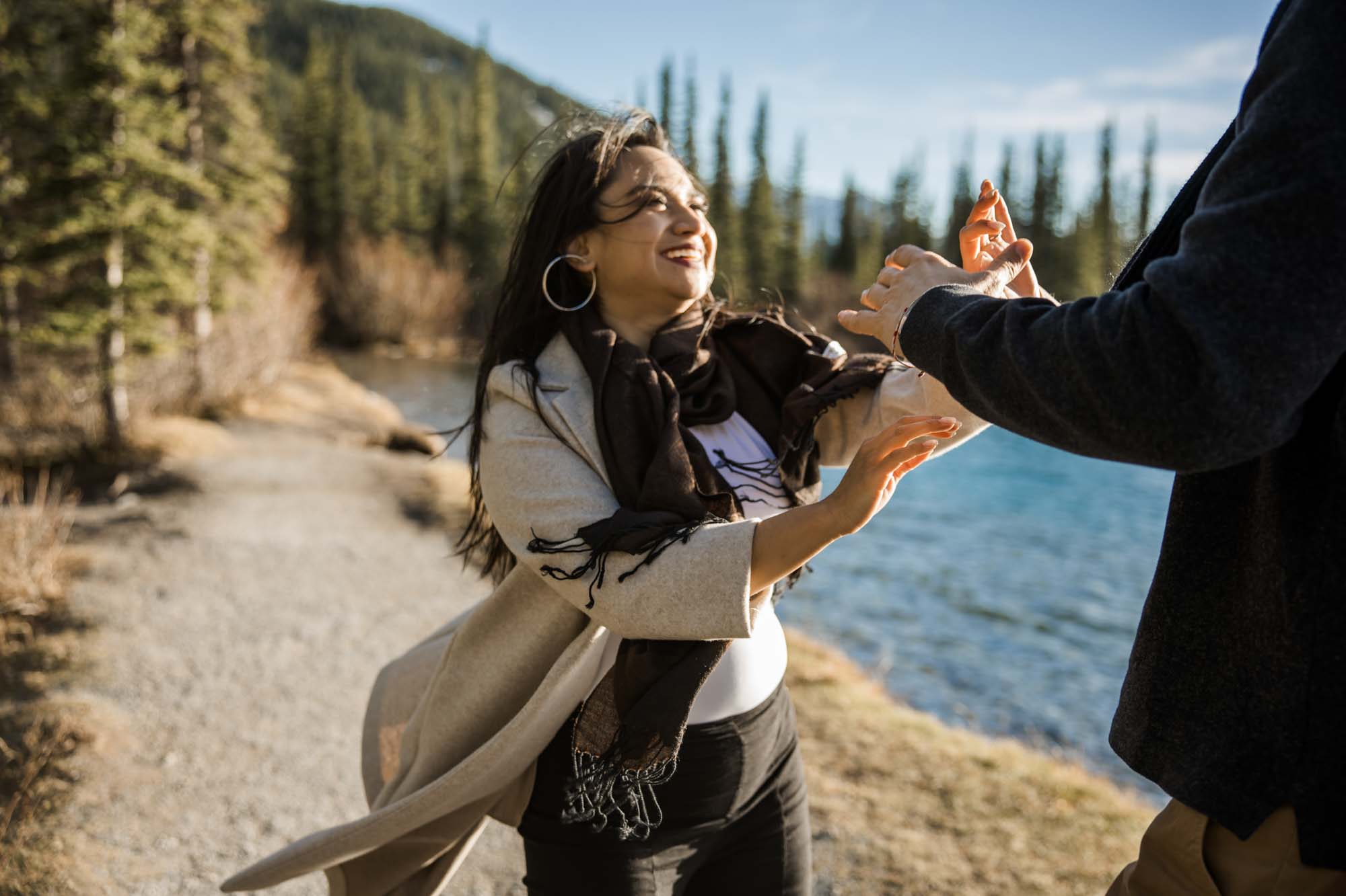 Calgary, Banff, Canmore, Kananaskis Country engagement and wedding photographer, couple during their engagement photoshoot y in the mountains, storytelling, candid, warm, editorial photography