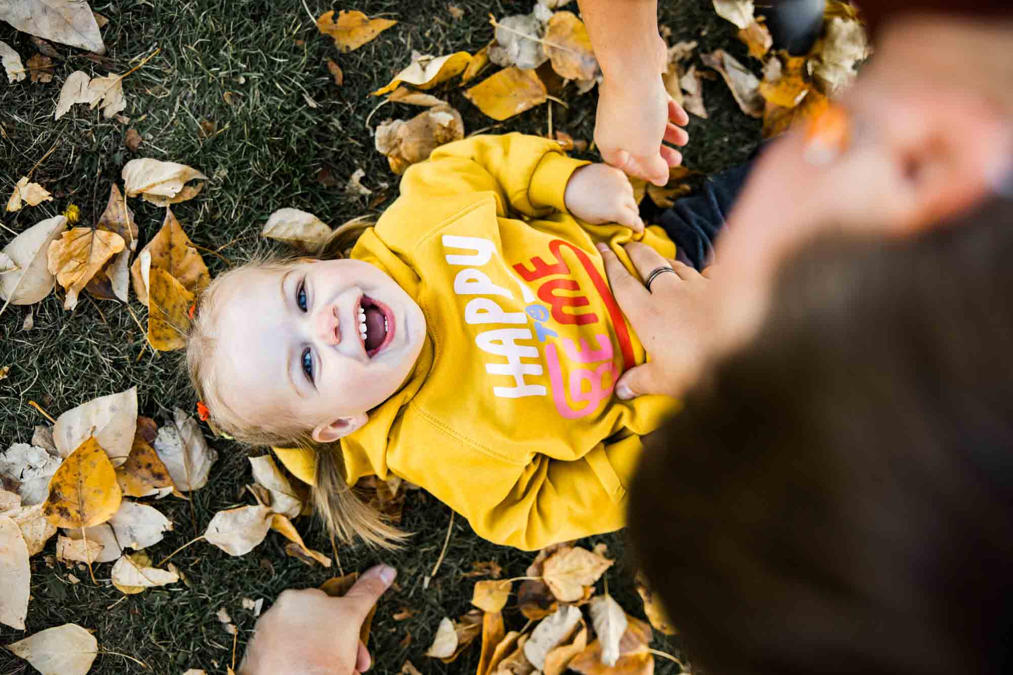 Calgary family photographer, extended large family photoshoot at St Patrick's Island, downtown, East Village, lifestyle, storytelling, candid