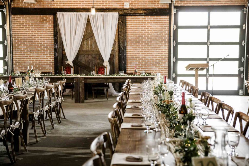 Calgary wedding photographer, bride and groom on their wedding day at Cork and Crate Estates in Olds Alberta, storytelling, candid, warm, editorial wedding photography