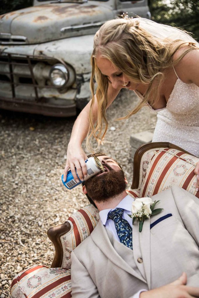 Calgary wedding photographer, bride and groom on their wedding day at Cork and Crate Estates in Olds Alberta, storytelling, candid, warm, editorial wedding photography