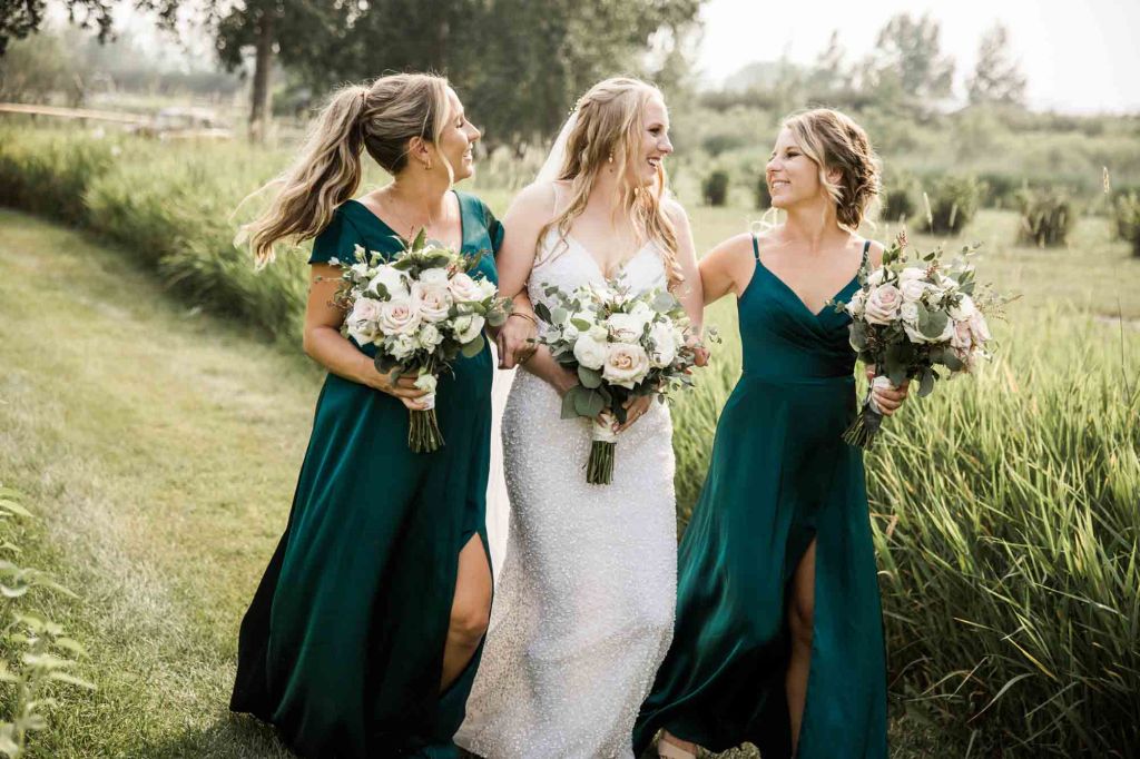 Calgary wedding photographer, bride and groom on their wedding day at Cork and Crate Estates in Olds Alberta, storytelling, candid, warm, editorial wedding photography