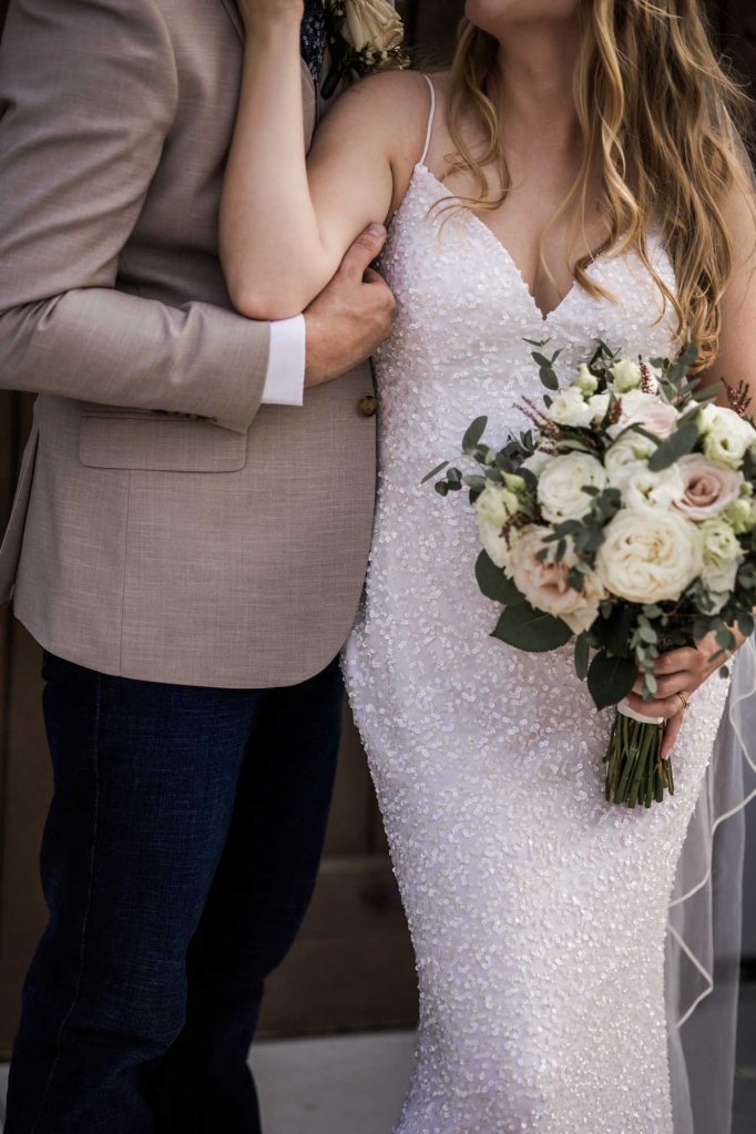 Calgary wedding photographer, bride and groom on their wedding day at Cork and Crate Estates in Olds Alberta, storytelling, candid, warm, editorial wedding photography