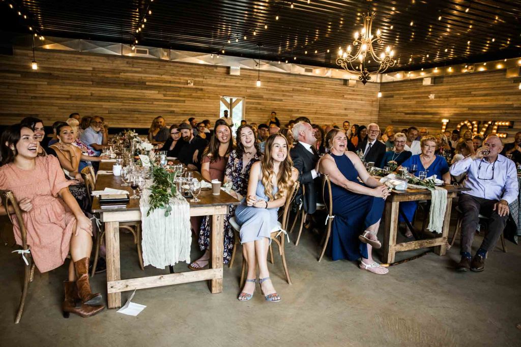 Calgary wedding photographer, bride and groom on their wedding day at Cork and Crate Estates in Olds Alberta, storytelling, candid, warm, editorial wedding photography