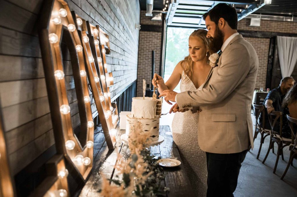 Calgary wedding photographer, bride and groom on their wedding day at Cork and Crate Estates in Olds Alberta, storytelling, candid, warm, editorial wedding photography