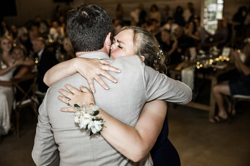 Calgary wedding photographer, bride and groom on their wedding day at Cork and Crate Estates in Olds Alberta, storytelling, candid, warm, editorial wedding photography