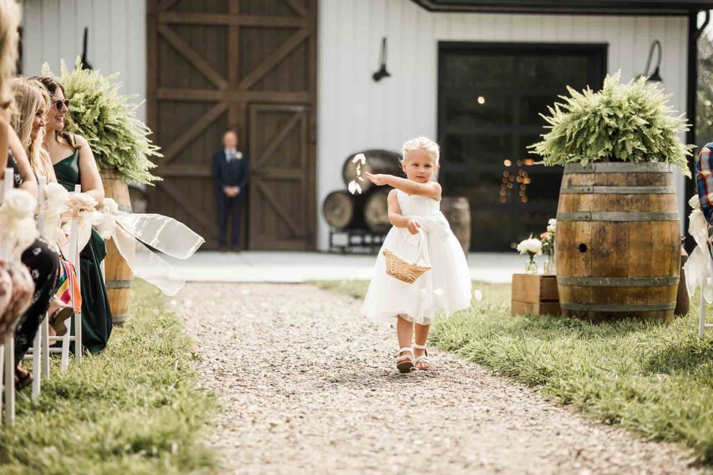 Calgary wedding photographer, bride and groom on their wedding day at Cork and Crate Estates in Olds Alberta, storytelling, candid, warm, editorial wedding photography