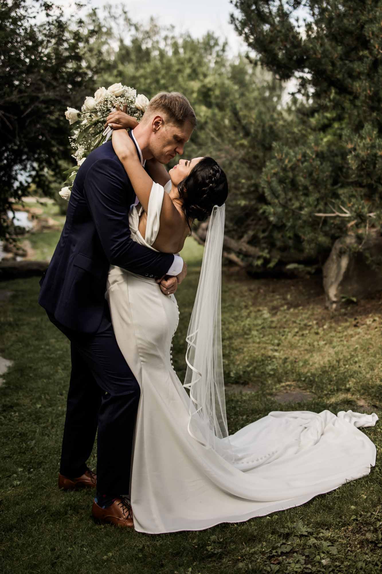 Calgary wedding photographer, wedding photography at the Lake House restaurant after a church ceremony and bridal portraits at Lake Bonavista. Photos captured in a candid, storytelling, documentary style